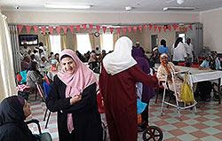 elderly being entertained and honored by youth