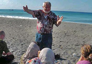 Shaykh Taner Ansari giving sohbet on the beach